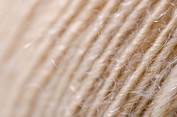 Beige wool thread macro texture material blur background
