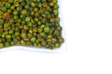 green spicy peas isolated on white background. 
