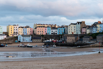 Fototapeta na wymiar Tenby Colourful Houses and harbour at Sunset, Pembrokeshire, Wales, UK