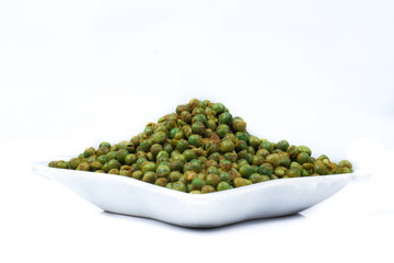 green spicy peas isolated on white background. 