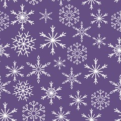 Christmas snow seamless pattern with beautiful snowflakes falling and scattered on tiled repeating ornament of winter snow