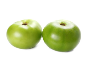Green tomato isolated on white