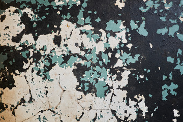 old cracked paint texture. white, blue and black colored wall