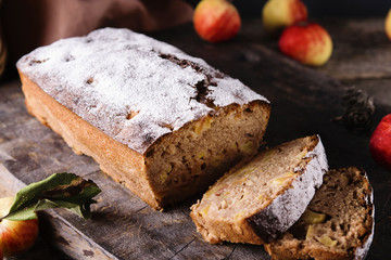 Homemade Apple Cinnamon Coffee Cake with fresh apples on old rustic wooden table. Selective focus