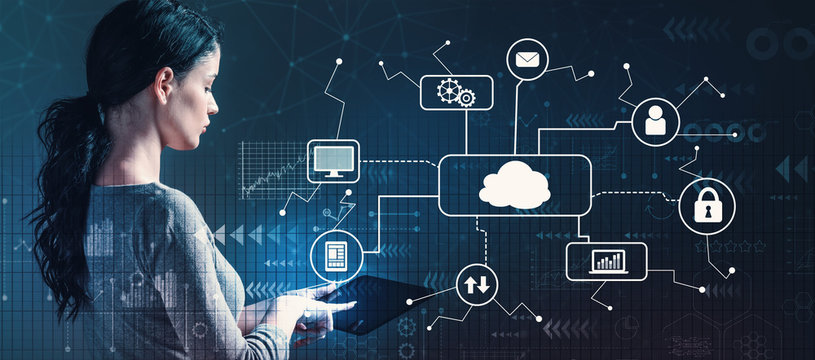 Cloud computing with business woman using a tablet computer