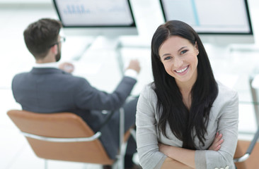 successful business woman on the background of a modern workplace