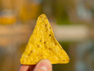 Corn chips in hand