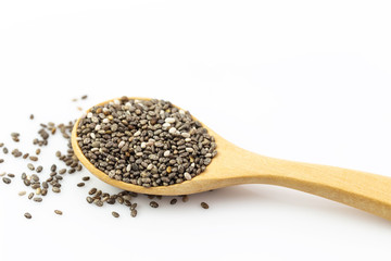 chia seeds in wooden spoon Isolated on white background