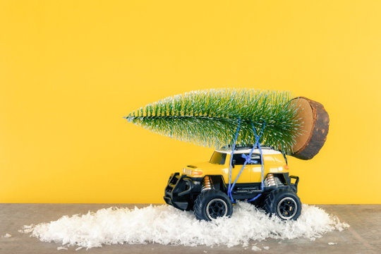 Yellow SUV Monster Car Truck Toy With Fir Tree