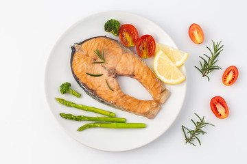 Salmon Grilled on a white plate isolated on white background.