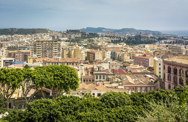 Fototapeta na wymiar Cagliary cityscape from the terrace 'Umberto I' . From the large “Umberto I” terrace you can enjoy a wide view of the city and of the port of Cagliari