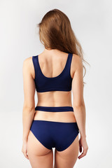 Fototapeta premium Beautiful woman in blue bikini