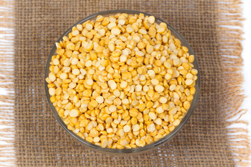 Dried fenugreek seeds isolated on white background