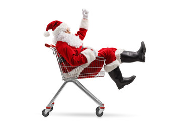 Santa Claus sitting inside a shopping cart © Ljupco Smokovski