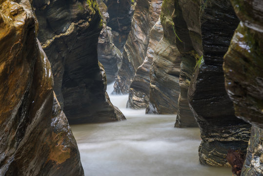 Nature canyons with waterfall surrounded by rocks