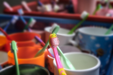 Colorful children's toothbrushes, Group of baby toothbrush prepare for use with childrens, Background for healthcare in nursery or kindergarten or preschool concept, selective focus