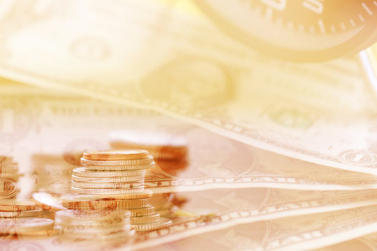 Double exposure Rows of coins of Clock,cash,money, dollar on the table,finance and business concept,Tex time soft focus and blurred style,dark tone. - Powered by Adobe