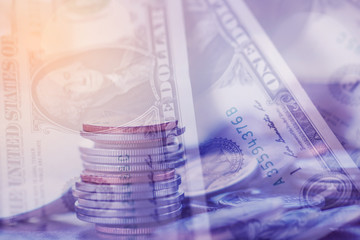 Double exposure Rows of coins of Clock,cash,money, dollar on the table,finance and business concept,Tex time soft focus and blurred style,dark tone.