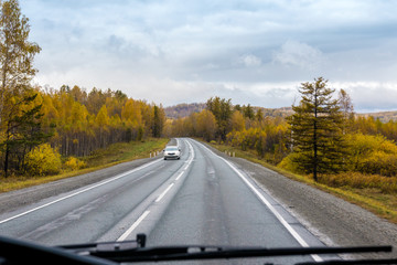 Fototapeta premium autumn view of the highway from the cab