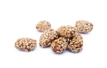 Coated peanuts with sesame isolated on white background