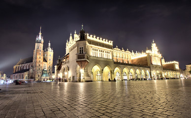 Fototapeta na wymiar Cloth Hall and St Mary s Church at Main Market Square in Cracow Poland