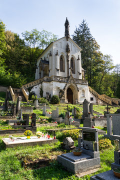 Saint Maximilian Chapel on cemetery in Saint John under the Cliff, Svaty Jan pod Skalou, Czech Republic, sunny summer day