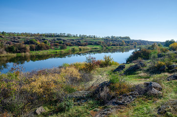 Fototapeta na wymiar Beautiful scenery of the river. Valley of the Kamyanka River in the Dnipropetrovsk region, Ukraine.