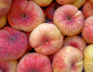fresh juicy peaches top view closeup, fruit background