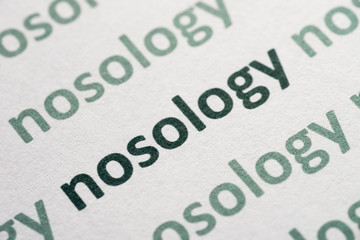 word nosology printed on paper macro