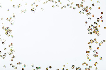 Round colorful sequins on white background