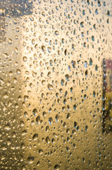 background of raindrops on window glass, close up