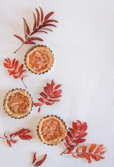Mini apple cakes with cup of coffee. Enjoy autumn, colors. Keep memories of this autumn. Decorate leafs