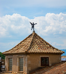 Rooftop figure on the Plaza de Catedral in Girona