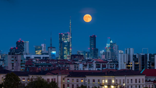 A Single Shot Of The Full Moon In Milan Business District