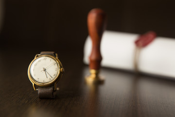 Last Will legal document and pen, clocks