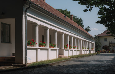 white corridor with doors