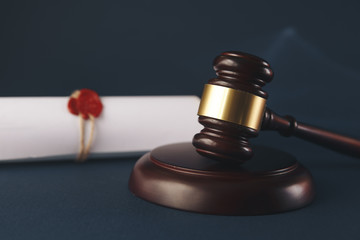 Law gavel in courtroom. Legal system justice concept.