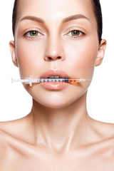 Beautiful woman with injection in her lips. 