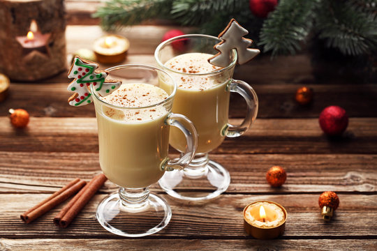 Eggnog In Glasses With Gingerbread Cookies On Wooden Table