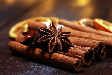 Fragrant star anise and cinnamon on wooden table
