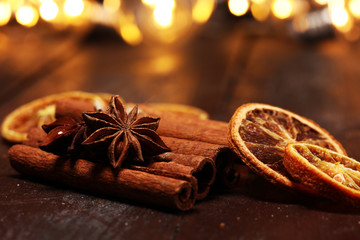 Fragrant star anise and cinnamon on wooden table