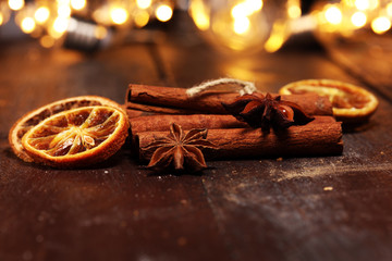 Fragrant star anise and cinnamon on wooden table