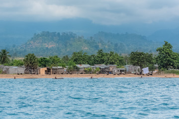 Sao Tome, beautiful landscape, village, beach and rainforest in background
