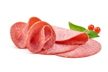 Italian smoked salami sausage slices with basil leaves. Isolated on white background. Close-up - obrazy, fototapety, plakaty