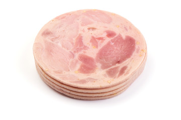 Sliced Fresh Pork ham, close-up, isolated on a white background.
