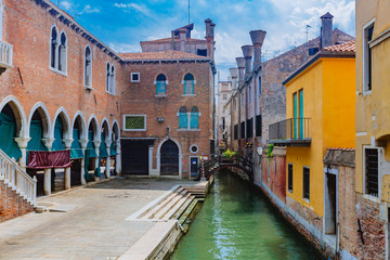 Venetian buildings by canal in Venice, Italy