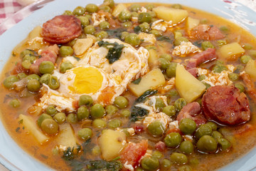 green peas with egg, potatoes and chorizo