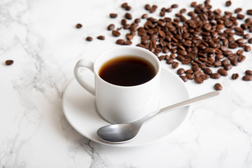 cioffee cup on marble tablea