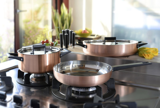 set of cookware on the hob