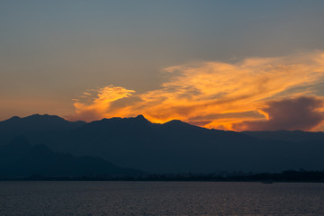 beautiful sunset above sea and taurus mountains in Antalya, Turkey